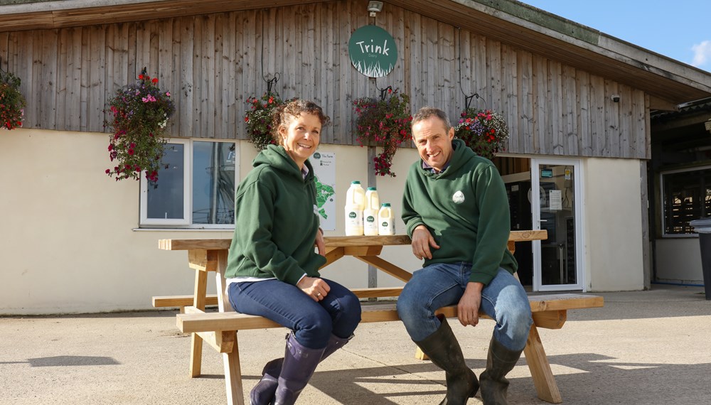 Taw River Dairy owners sat outside store front