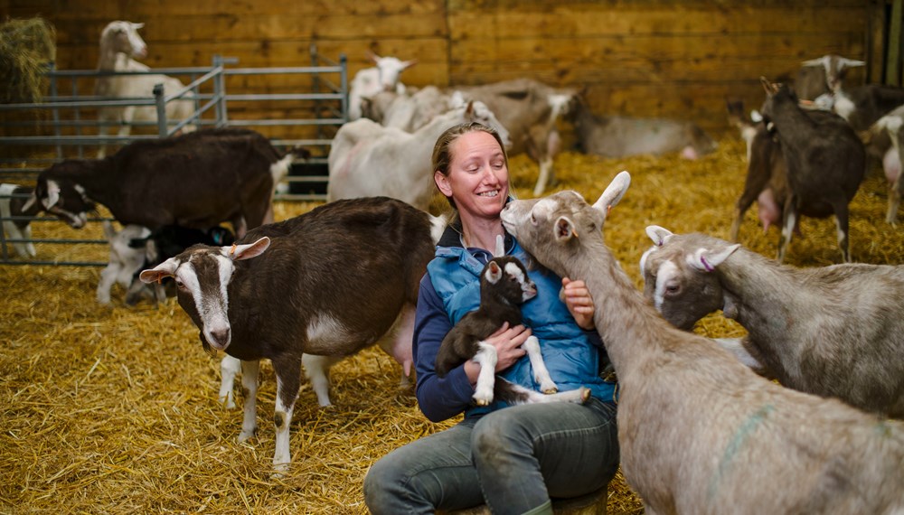 Sara Davies Wookey Farm Somerset holding a goat