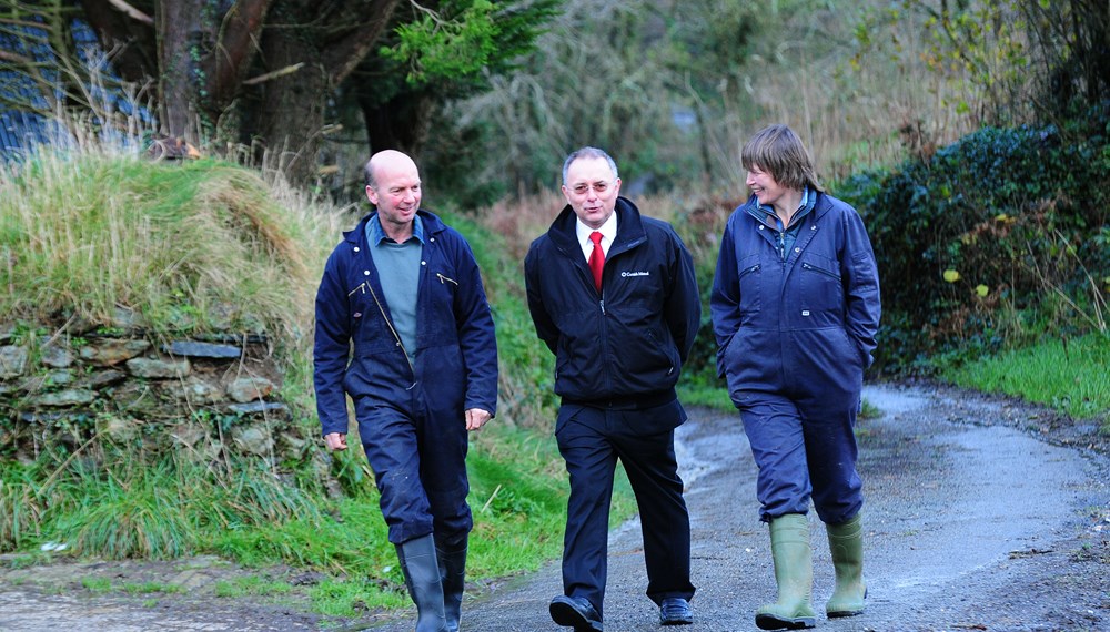 Ley Green Farm Kath and Roy walking with Insurance Advisor down their farm lane